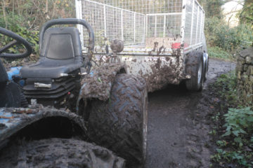 muddy tractor picking