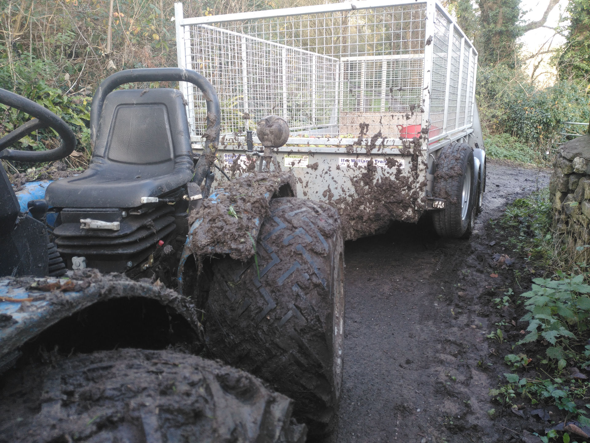 muddy tractor picking